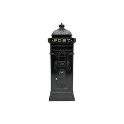 Reproduction Victorian style black painted aluminium floor standing post box, with lion mask decoration to the front, with keys