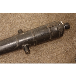  19th century cast iron canon barrel, four banded tapering from with twin mounting lugs, L82cm  
