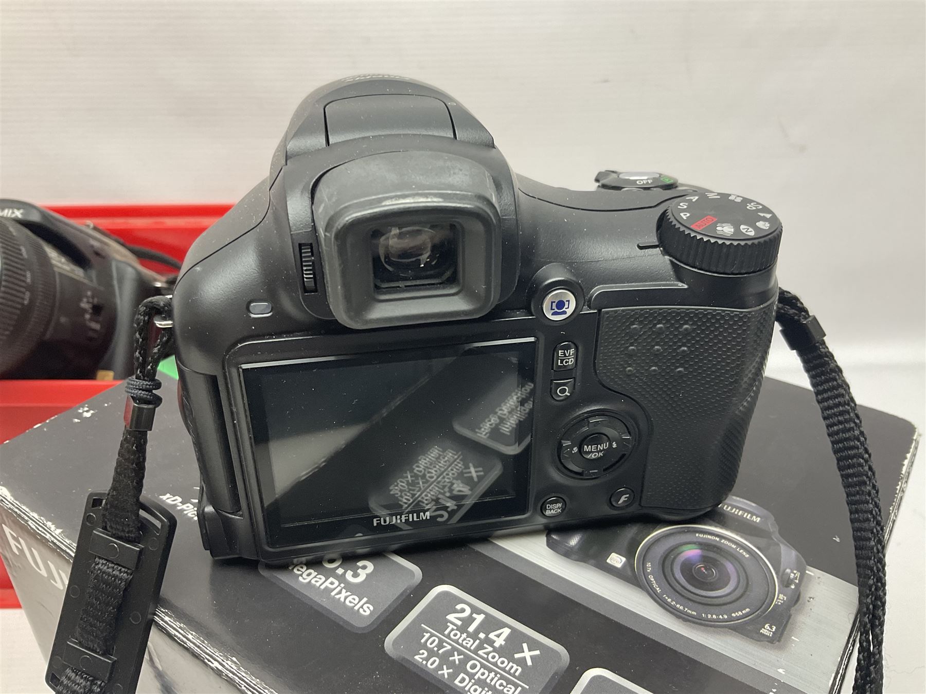 Minolta Dynax 5xi camera body serial no 17222646 with 'AF Zoom Xi 28-80mm 1:4(22)-56' lens serial no 17220881, Minolta SRT101 camera body serial 1944687, Lumix camera body serial no K6SC10168 etc 