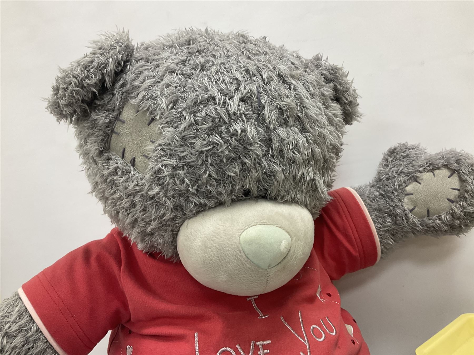 Scooter 2000 plastic battery operated remote control waiter robot with tray and remote control unit; together with a large 'Me To You' floor standing teddy bear (2)