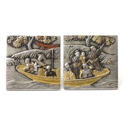 Pair of Japanese Shakudo dress studs, decorated with a family in a boat, indistinctly sign...