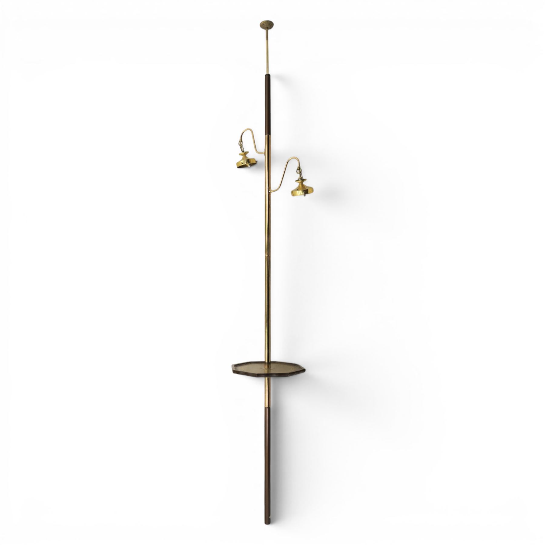 20th century floor to ceiling two branch standard lamp, with spring loaded ceiling mount, brass column, with octagonal moulded rim, green leather inset tooled 
