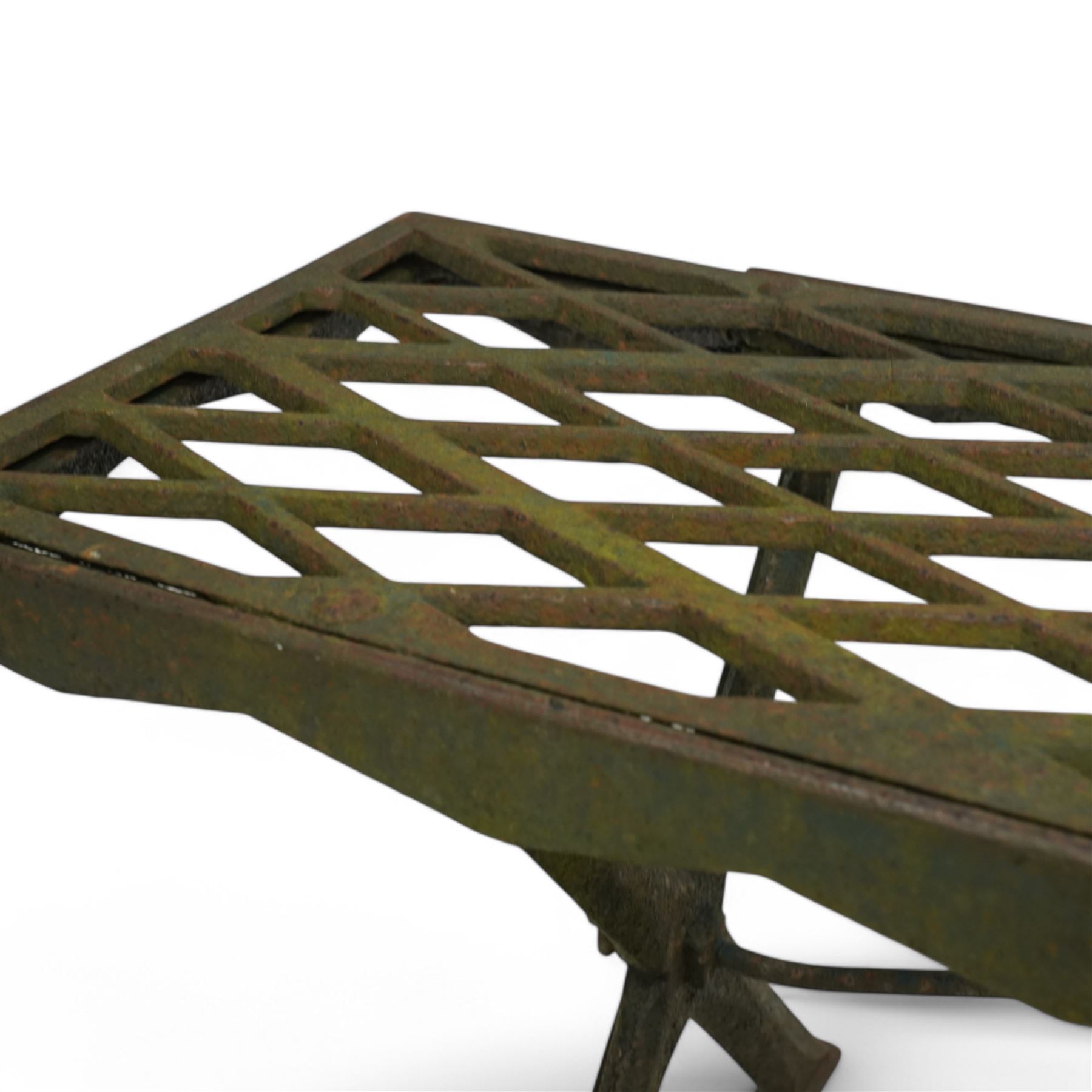 Two cast iron garden benches, rectangular seat with lozenge grate panels, on X-framed supports 