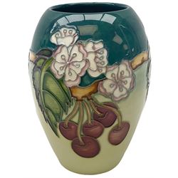 Moorcroft vase, of ovoid form, decorated in the Cherries pattern designed by DJ Hancock, with impressed and painted marks beneath, including date symbol for 1999, H13cm. 