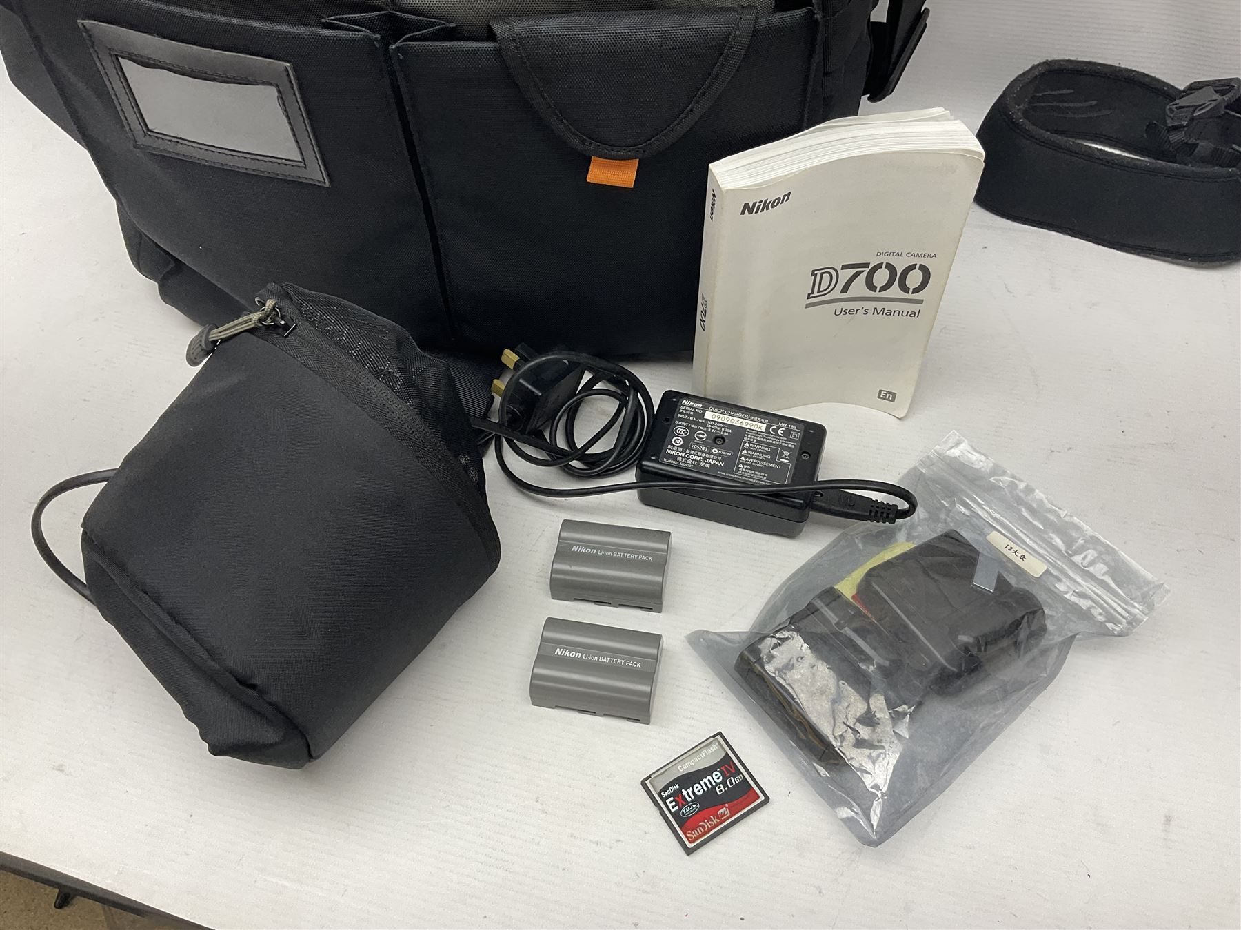Nikon D700 camera body, serial no 2257597, with Lowepro camera bag