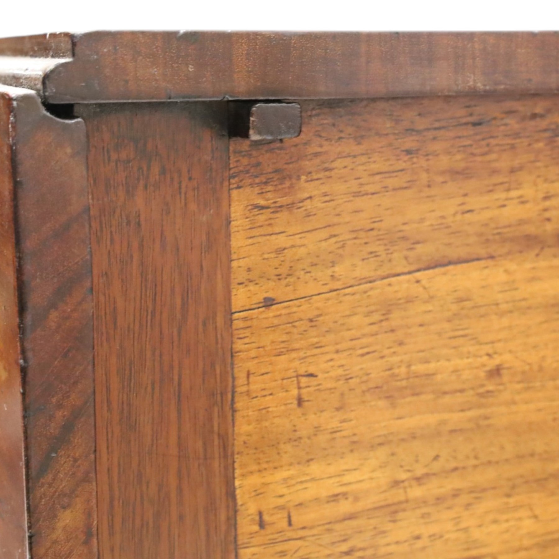 Early 19th century mahogany deception table with drop-front, rectangular top over drop-front with button action to the side, enclosing slatted-base compartment, raised on turned supports