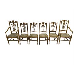 Set six (4+2) Edwardian satinwood dining chairs, triangular cresting rail painted with laurel wreath, shaped and pierced splat flanked by two shaped upright rails, with boxwood stringing, upholstered seats, on square tapering front supports with spade feet