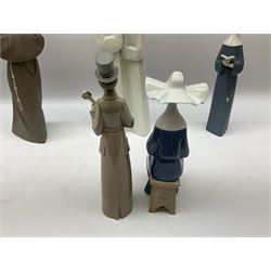 Three Lladro figures of nuns comprising Prayerful Moment no. 5500, Time to Sew no. 5501 and Two Nuns model no. 4611, together with figure of a monk no. 2060, and further Lladro bell figure