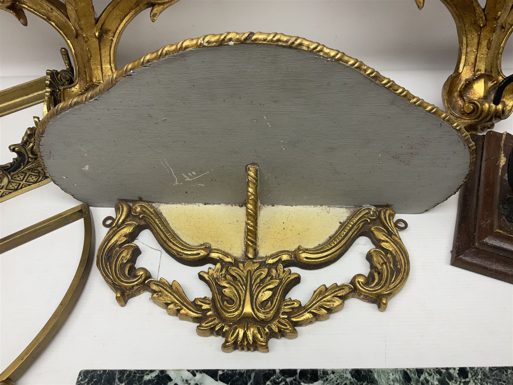 Five various giltwood and other hall brackets, one with marble top; and Viking ship table lamp