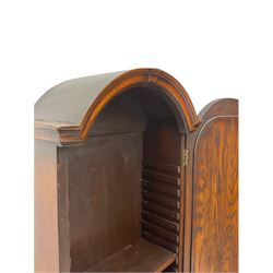 Small early 20th century Queen Anne style bookcase on bureau secretaire, the moulded arched pediment over mirrored door in shaped frame, the bureau fitted with fall front enclosing curved fitted interior, cushion moulded drawer over single drawer, on scroll and shell carved cabriole supports