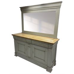 Large painted oak mirror back sideboard, moulded cresting rail over bevelled rectangular mirror, rectangular oak top over three frieze drawers, two panelled cupboards and central narrow cupboard, on stepped plinth base with compressed block feet, in washed laurel green paint and waxed finish 