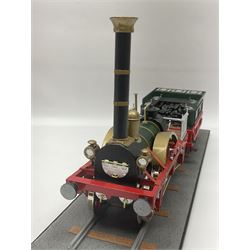 Wooden kit built model of a German Locomotive, Adler, 1:24 scale, on track base, together with a wooden kit built model of a Dennis Bus, 1:24 scale, both by OcCre, Ocio Creative, tallest H15.5cm