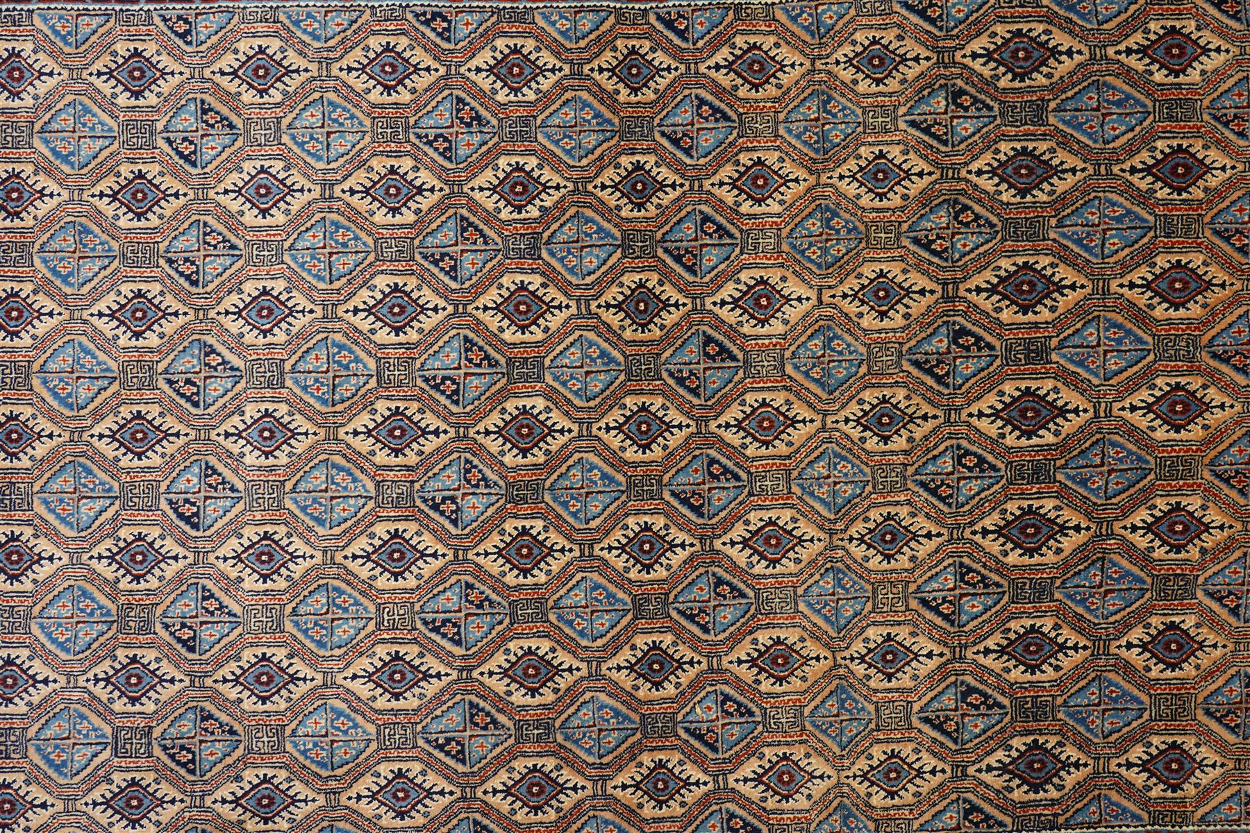 North East Persian Moud hand-knotted carpet, ivory field with an-over Herati inspired lattice of repeating lozenge and diamond motifs, with stylized floral devices and angular vinery in tones of sky blue, indigo, madder red and camel, principal border with a sequence of stylized palmettes and angular vine motifs, framed by narrow guard stripes, with cotton fringe ends