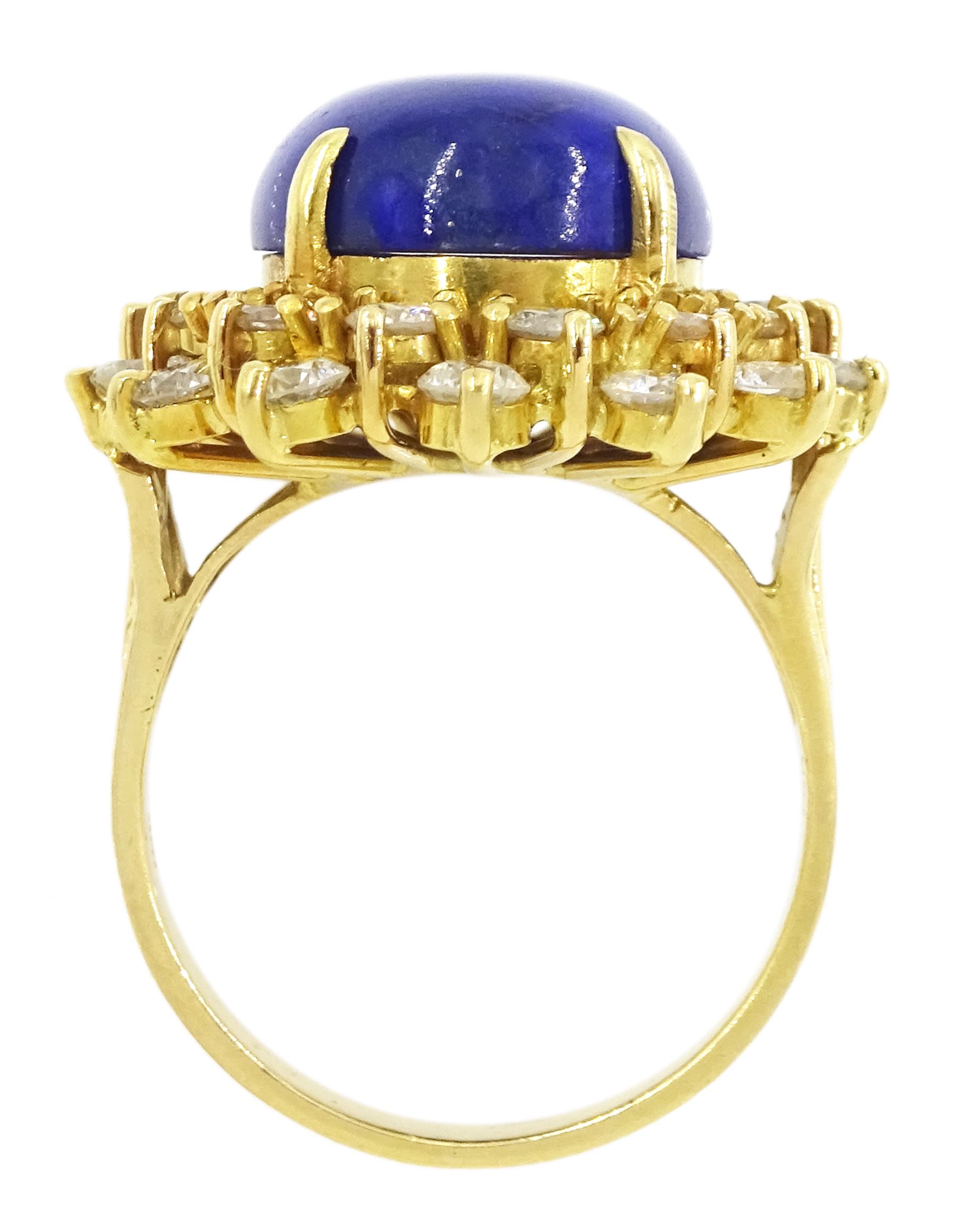 18ct gold lapis lazuli and diamond cluster ring, single oval cut lapis lazuli with two rows of round brilliant cut diamonds, stamped 750, total diamond weight approx 1.70 carat
