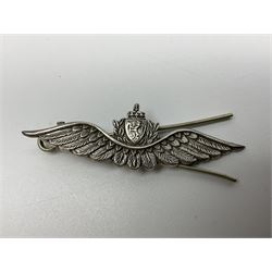 Popski's Private Army sterling silver cap badge; and two silver sweetheart brooches for Highland Light Infantry as a rifle and silver gilt Glengarry badge and Army Service Corps with blue enamel; and another silver badge (4)