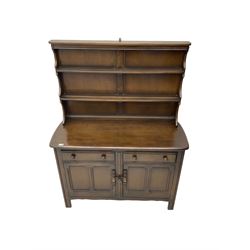Ercol - elm dresser, fitted with two drawers over two panelled cupboards, and two-tier plate rack