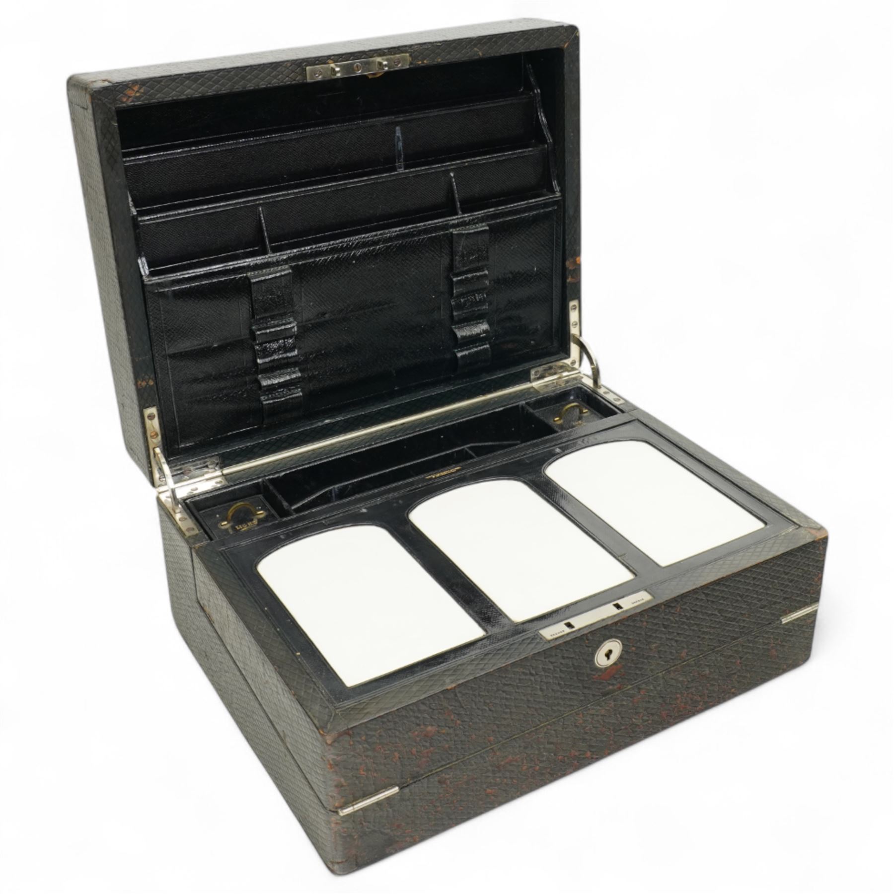 Early 20th century travelling writing box, by James Hurry of London, the leather exterior with Braman lock, the white metal cartouche engraved with FE monogram, opening to reveal compartmental interior, with 'Ink' and 'Light' boxes, and further to reveal writing slope, H18cm x W35cm x 27cm 