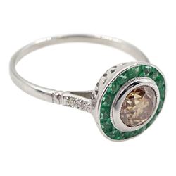 18ct white gold calibre cut emerald and fancy champagne colour diamond target ring, with diamond set shoulders, stamped 18K, total emerald weight approx 0.45 carat, central diamond approx 0.80 carat
