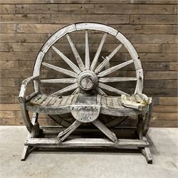 Early 20th century timber framed cartwheel garden bench