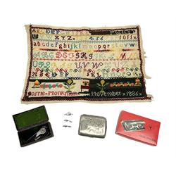 Victorian sampler worked with the alphabet by Carrie Monkman 1886, Victorian silver-plated cigarette case, Carlo simulated tortoiseshell motorised fan in case, Folding Opera Glasses, two chrome leaping Jaguar brooch and matching pin badge etc 