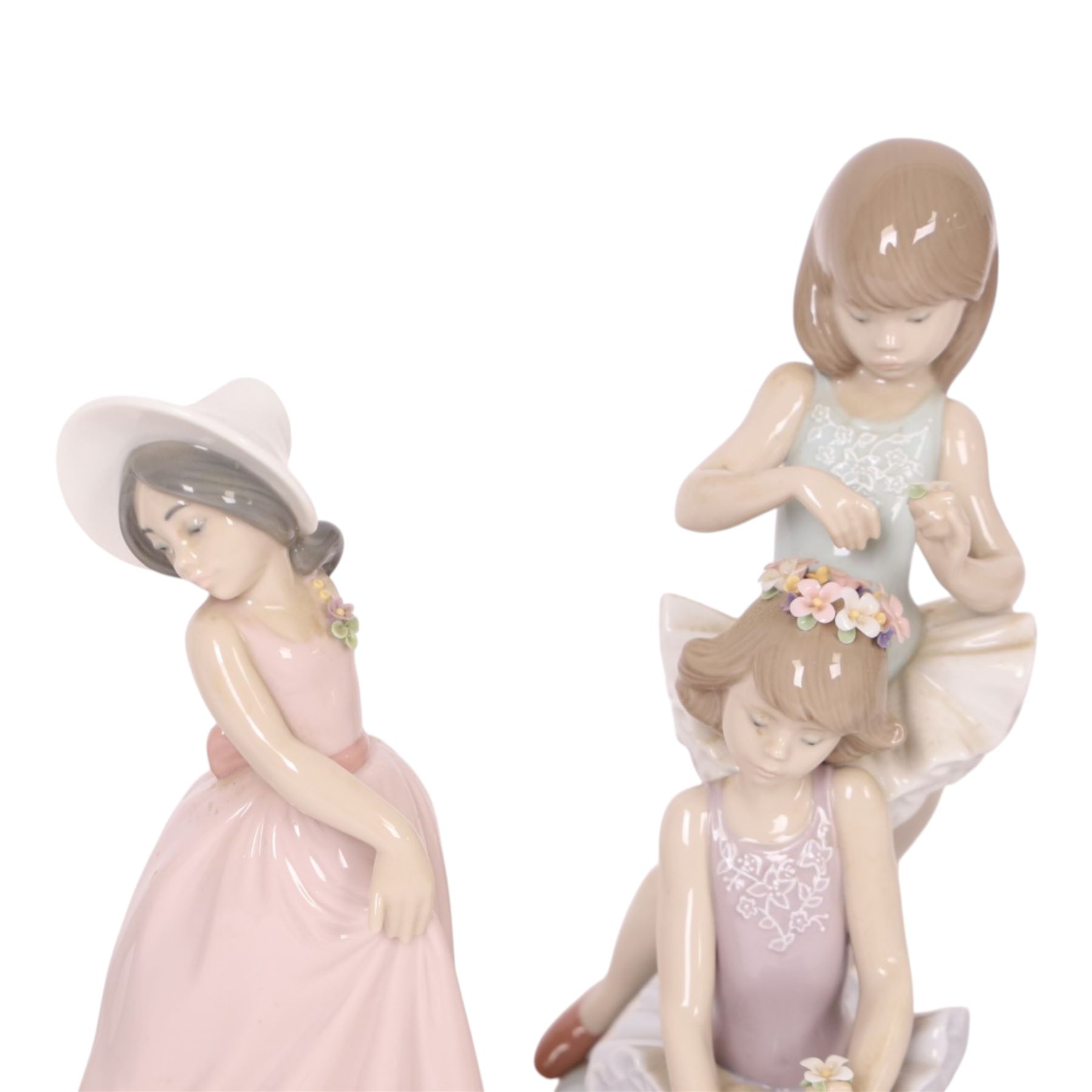 Four Lladro figurers, comprising First Ballet 5714, Iris 6276, Rose 6275 and Daisy 6274, all boxed 