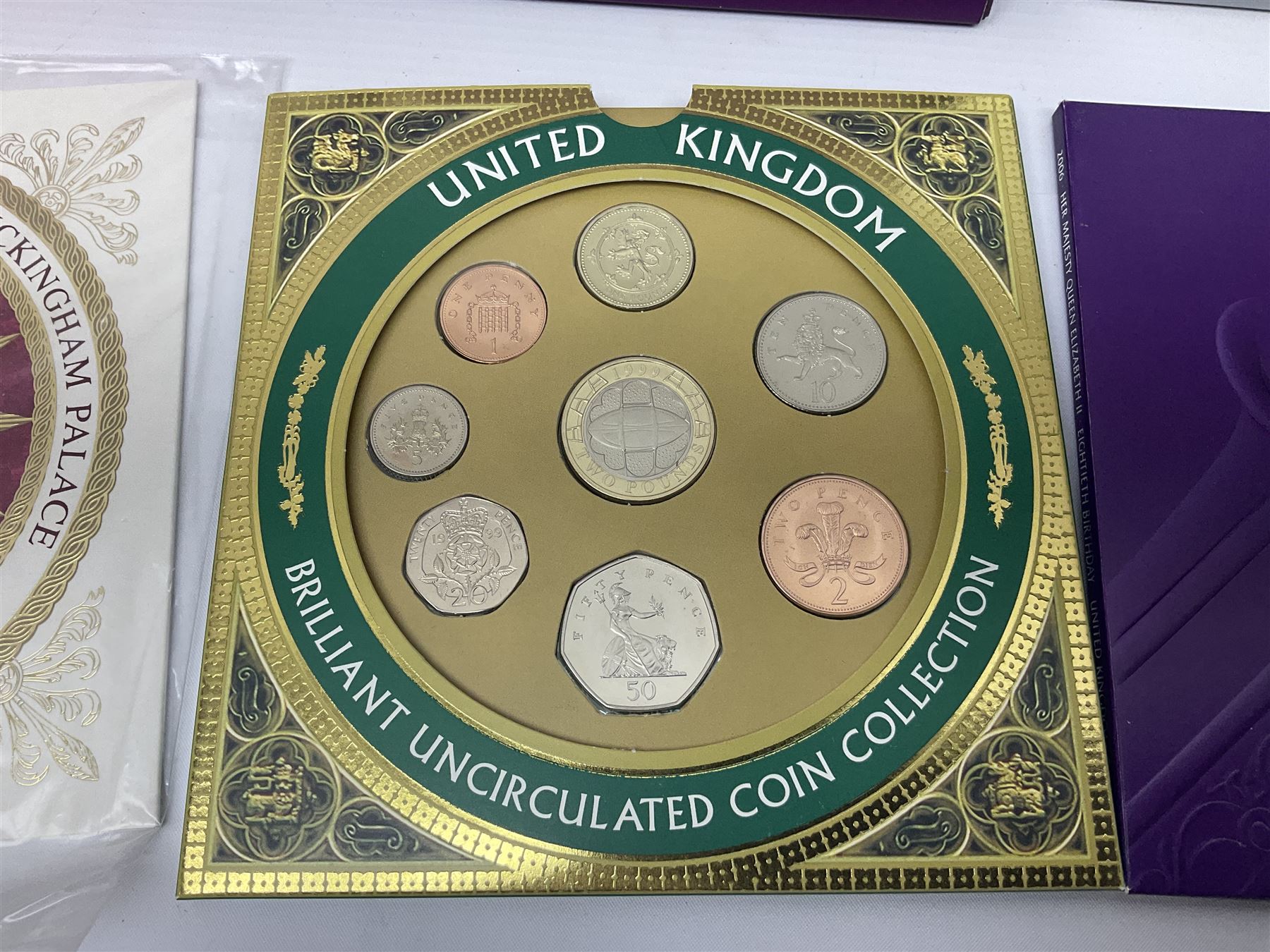 The Royal Mint United Kingdom 'Millennium' silver proof two coin set comprising 1999 and 2000 five pound coins, 2000 'The Queen Mother Centenary Year' silver proof crown, 2001silver proof one pound, 'Her Majesty The Queen Golden Jubilee 1952-2002' silver proof 2002 five pound coin and ten pound banknote set, all being cased with certificates, United Kingdom 1999 brilliant uncirculated coin collection in card folder, other commemorative coinage etc