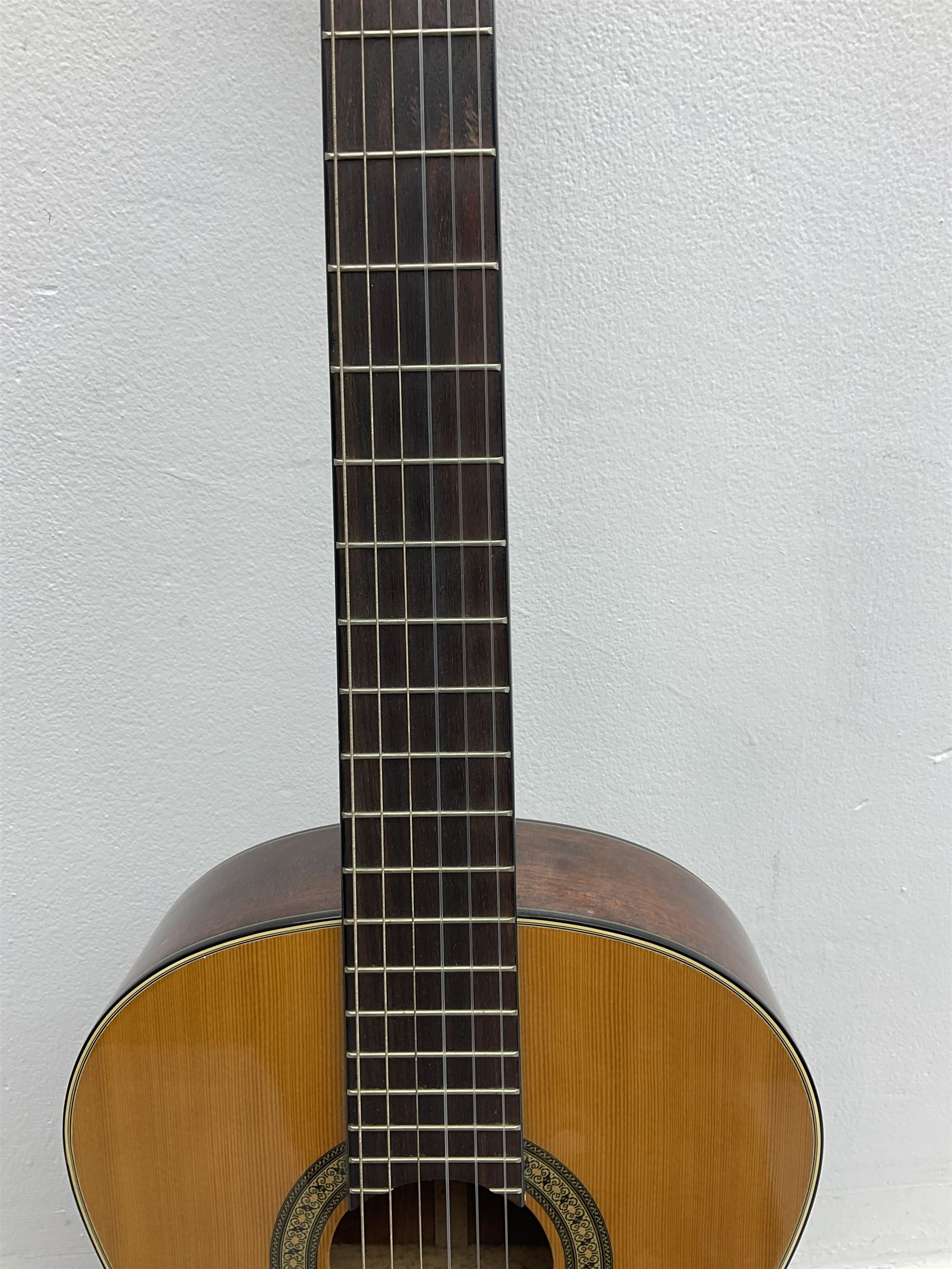 Nagoya Suzuki Model SC240 acoustic guitar with mahogany back and ribs and spruce top, bears label, L101cm; in soft carrying case