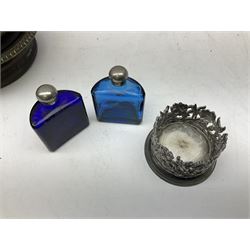 Four 19th century silver plated wine bottle coasters, together with hallmarked silver collared and lidded glass cruet trio and ornate silver cruet holder missing liner, with handle, and other silver plate etc