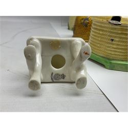 Large collection of honey pots, of various shapes, to include examples from Crown Devon, Marutomo ware, W.H Gloss, Goebel etc 