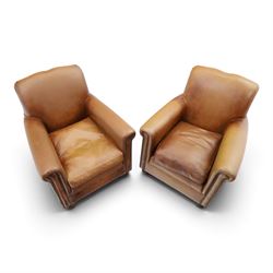 Pair of brown faux leather tub armchairs, scrolled arms with studded detail, turned front feet