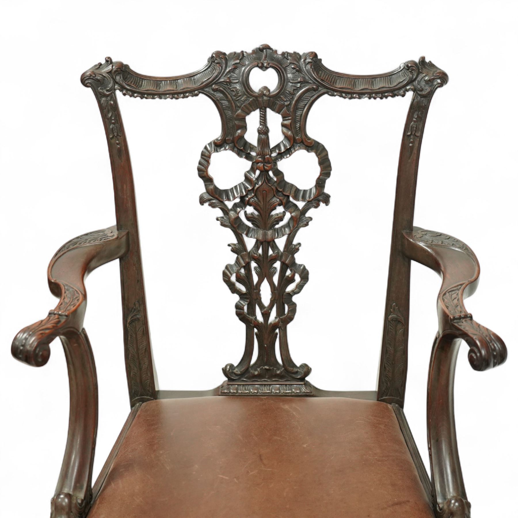 Set of eight 20th century Chippendale design mahogany dining chairs, including two carvers, each with pierced ribbon back splat carved with acanthus leaves, drop-in leather upholstered seats, moulded seat rails, on cabriole legs with ball and claw feet