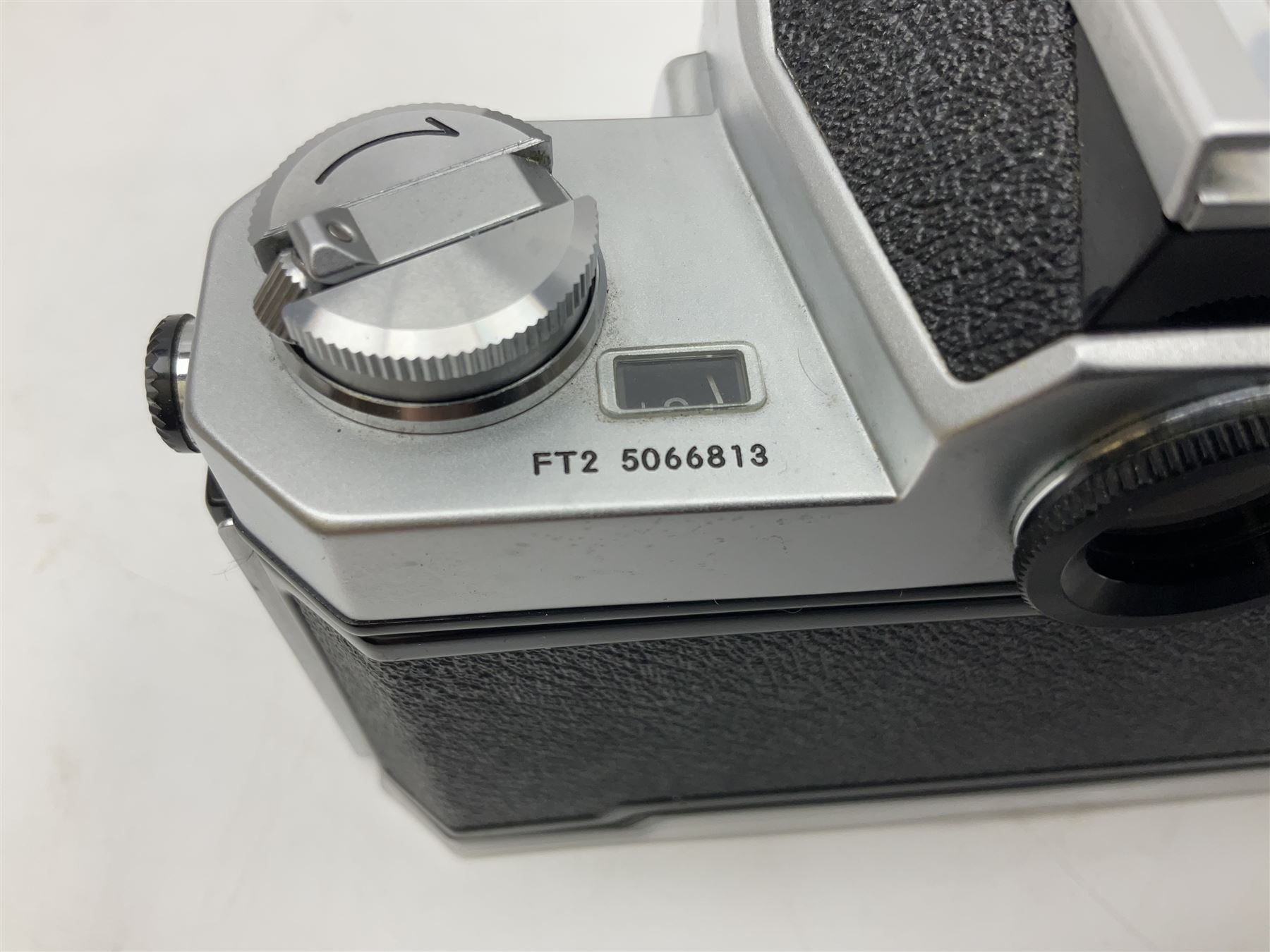 Nikkormat FT2 camera body, serial no. 5066813, in original packaging, together with Nikkormat EL camera body, serial no. 5577358, with Nikon Nikkor 50mm 1:1.8' lens no. 2143575, Nikkormat FT, serial no. 3968385, and Nikomat FT camera body, serial no. 4015491