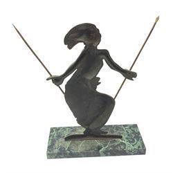 A bronze model of a dancer in tribal dress, upon a rectangular verdite base, H34cm