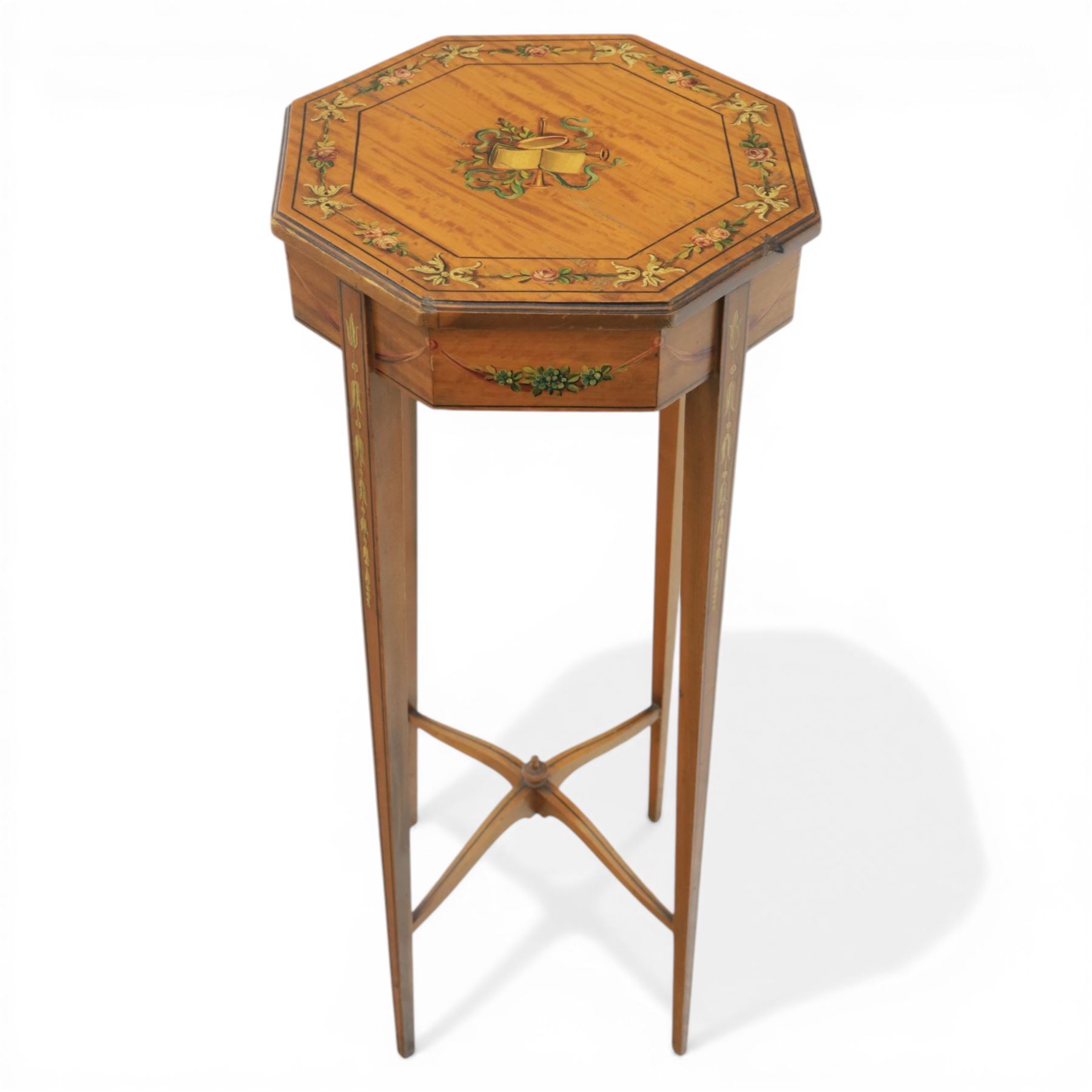 Edwardian inlaid satinwood occasional table, the octagonal top with central painted classical urn within floral garland border, shaped frieze with further painted swags, raised on square tapering legs united by an undertier stretcher