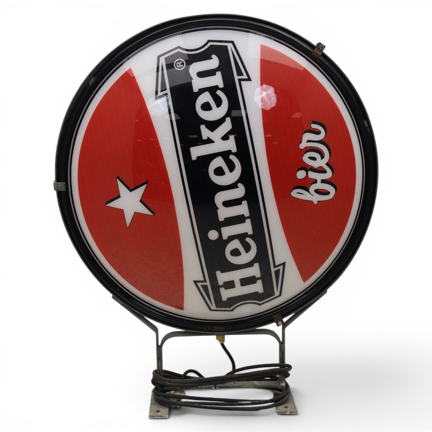 Heineken Bier Advertising sign - circular convex backlit logo, on cast metal bracket