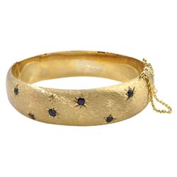 9ct textured and polished gold bangle, set with sapphires by Cropp & Farr Ltd, Birmingham 1967