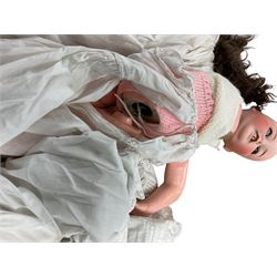 Two German porcelain dolls with moveable limbs