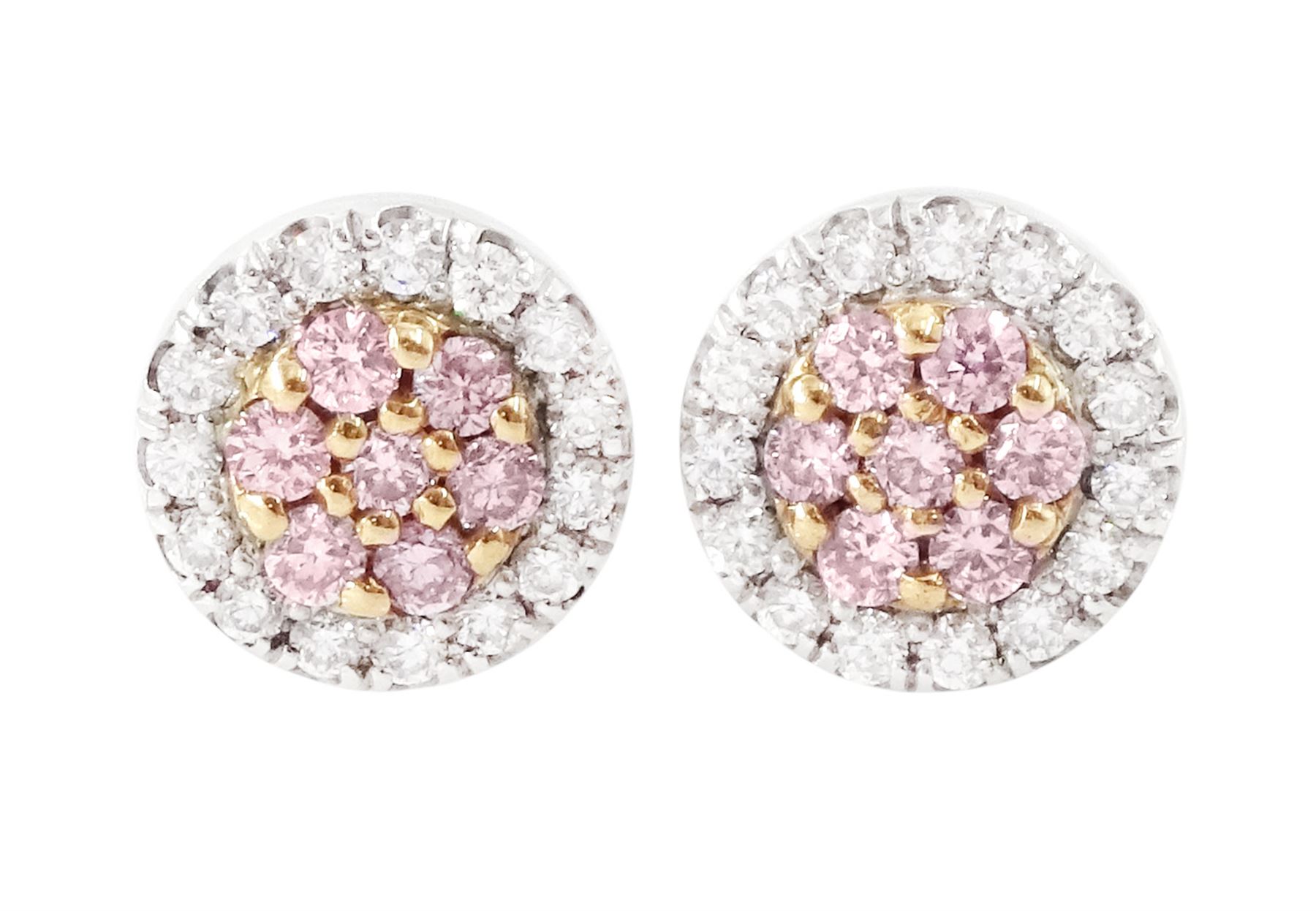 Pair of 18ct white and rose gold diamond cluster earrings, each stud set with seven round brilliant cut fancy pink diamonds, surrounded by white diamonds, hallmarked