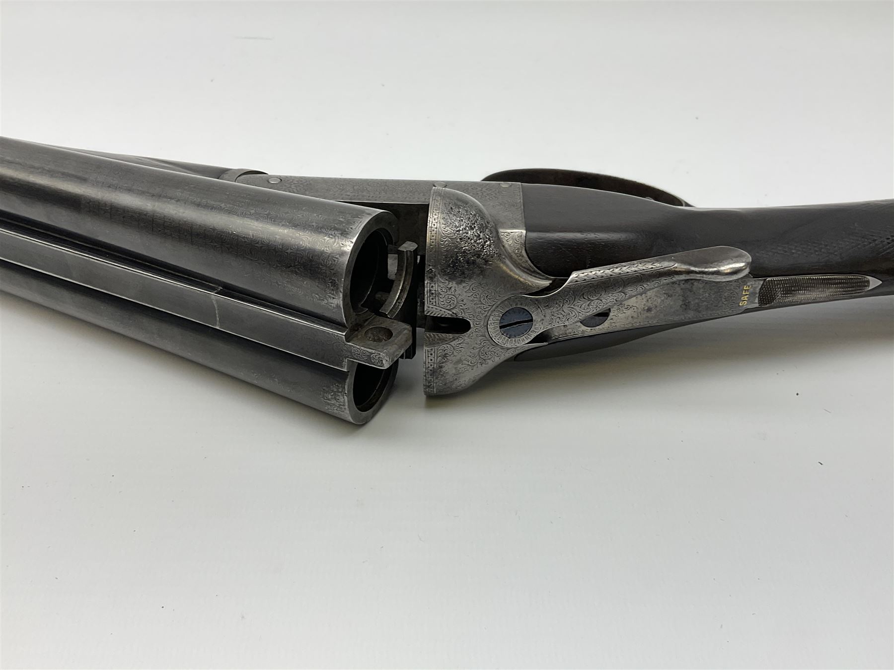 Charles Boswell 12-bore side-by-side double barrel box-lock non-ejector sporting gun, with 71.5cm sleeved barrels, thumb safety, walnut stock with chequered grip and fore-end, serial no.12720, L112.5cm overall SHOTGUN CERTIFICATE REQUIRED