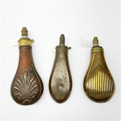 Three Victorian Sykes Patent copper and brass powder flasks, one embossed with stylised shells, one with reeded decoration and one plain, largest H21.5cm (3)