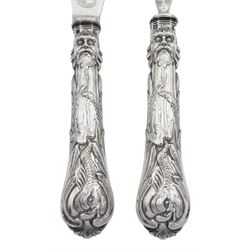 Pair of Victorian silver handled fish servers, the handles modelled with Neptune masks and fish, the shaped blade with pierced and engraved foliate decoration, hallmarked John Roberts, Sheffield, no date letter visible, contained within a case with blue silk and velvet lined interior 
