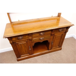  Early 20th century oak dresser, three tier plate rack, four drawers, two cupboard doors, plinth base, W140cm, H197cm, D50cm  