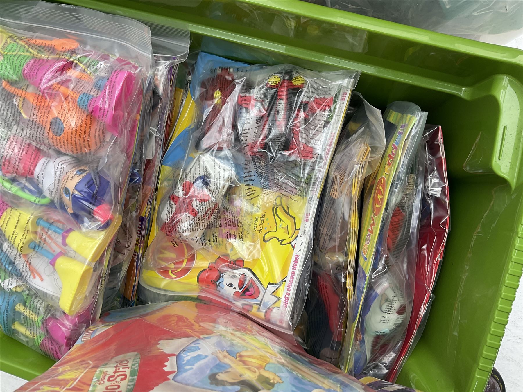 Large quantity of Mcdonalds toys in three boxes