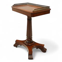 Late Regency mahogany side table in the manner of Gillows, the rectangular top with pierced brass gallery, raised on a reeded column and quatreform base with scroll carved feet with castors 