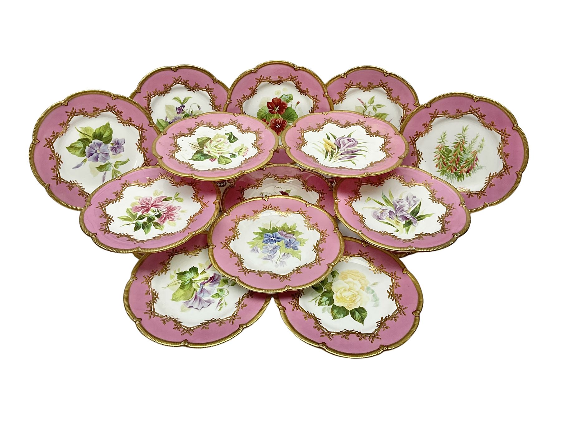 Victorian dessert service, comprising four comports and nine plates, each decorated with floral sprigs to the centre with a pink and gilt border, largest comport H13cm, plate D22.5cm
