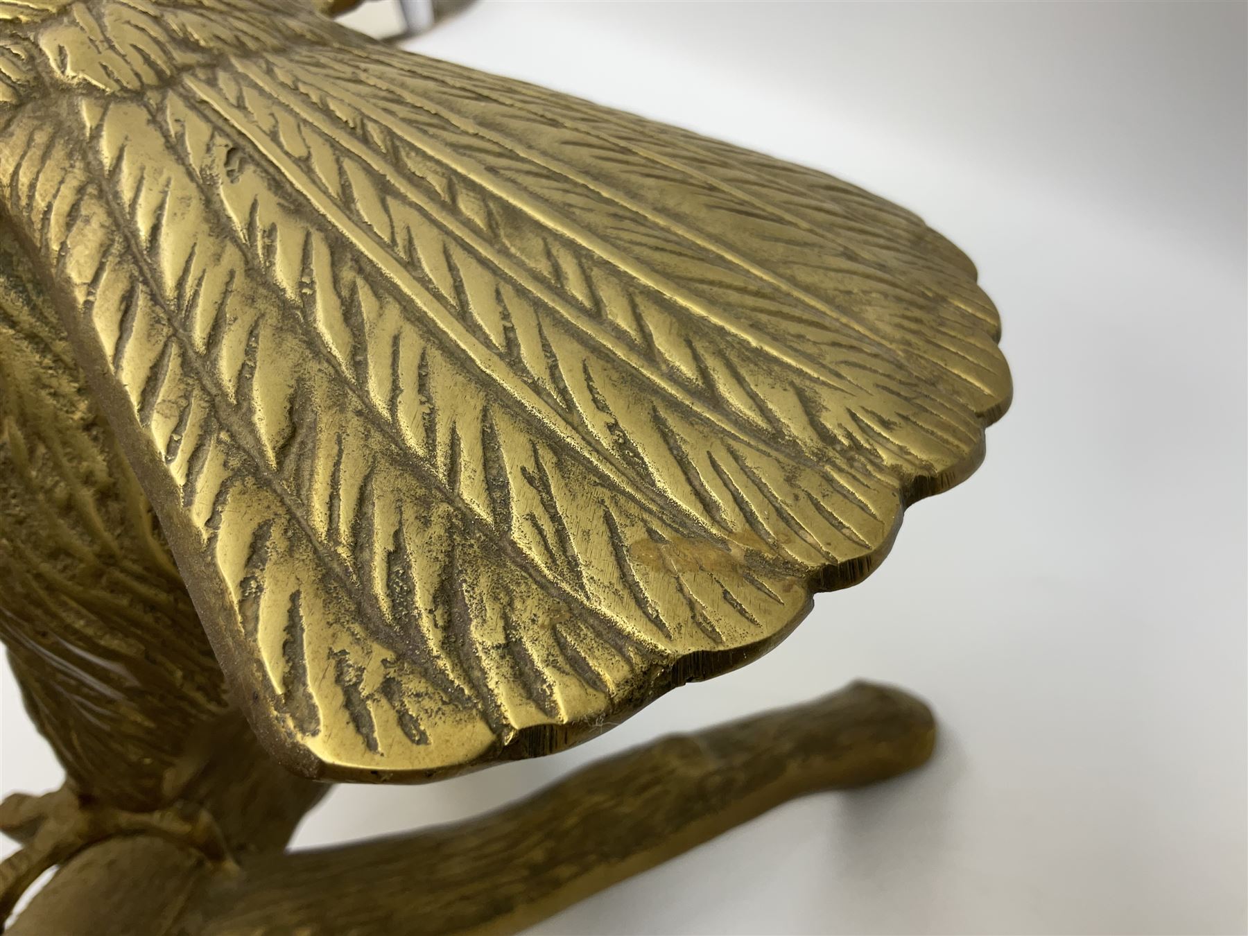 Large brass figure of an eagle on a branch, H51.5cm