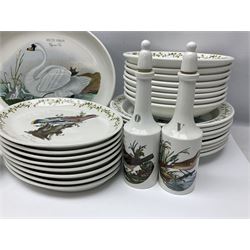 Portmeirion Birds of Britain pattern, dinner service for eight, to include covered soup tureen with ladle, dinner plates, soup bowls, side plates, oval plates, a serving platter, two oval serving dishes, salt and pepper, etc and eight shell dishes in the British fish pattern (56) 