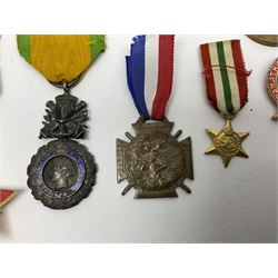 Five WW1 French medals comprising Medaille Militaire Gallantry Award, two Croix de Combattant, Medaille Commemorative Francais 1914-18 and a Patriotic Medal; together with small quantity of Russian badges etc