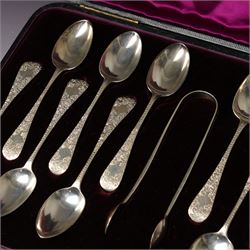 Cased set of twelve Victorian silver tea spoons and tongs with floral engraved stems London 1894 Maker Wakely & Wheeler