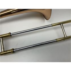 Sebastian Bucklet Aquae Sulis copper and brass trombone No.0910004; in lightweight carrying case; and Kinsman folding tubular chrome music stand in case (2)